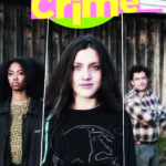 a poster of three people standing in a group. white girl with dark hair and blue streak in the middle, on the left black girl in a green shirt and on the right in the background a man with curly hair. they're standing in front of a barn. the title reads: Cow Chat Crime - der interaktive Chatkrimi auf Whatsapp. There's also a QR code and logos of the publishers
